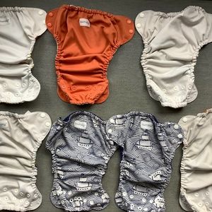 7 Esembly diaper covers, size 1
